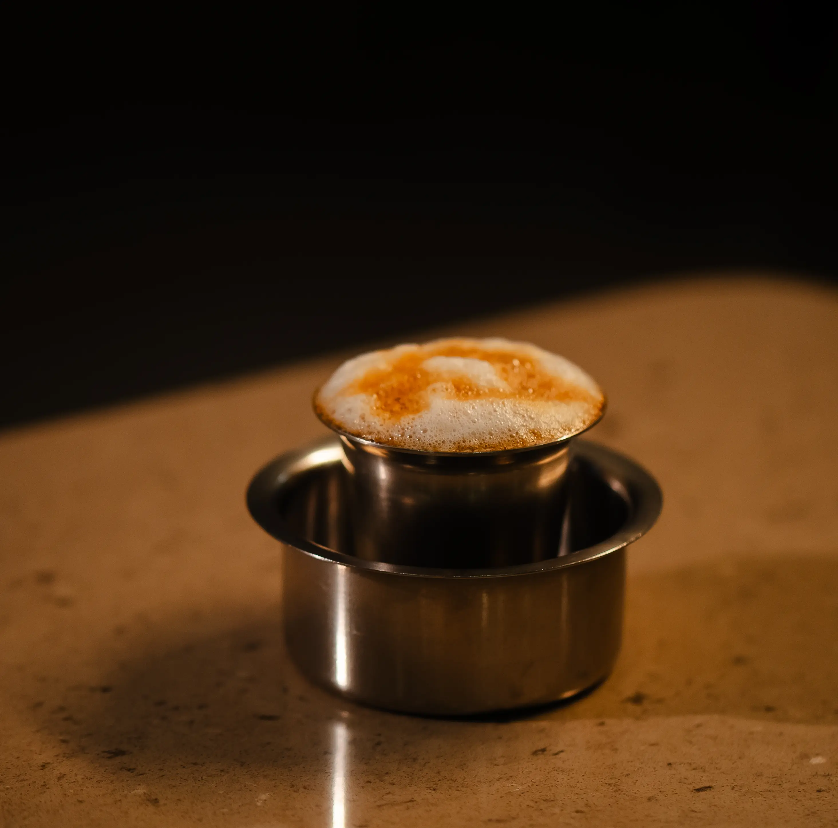 Guests enjoying a traditional meal on banana leaves at Anandam
