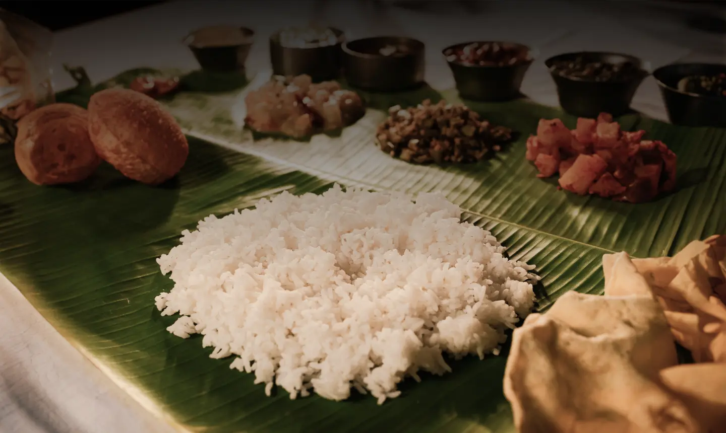 Traditional South Indian meal served on a banana leaf at Anandam