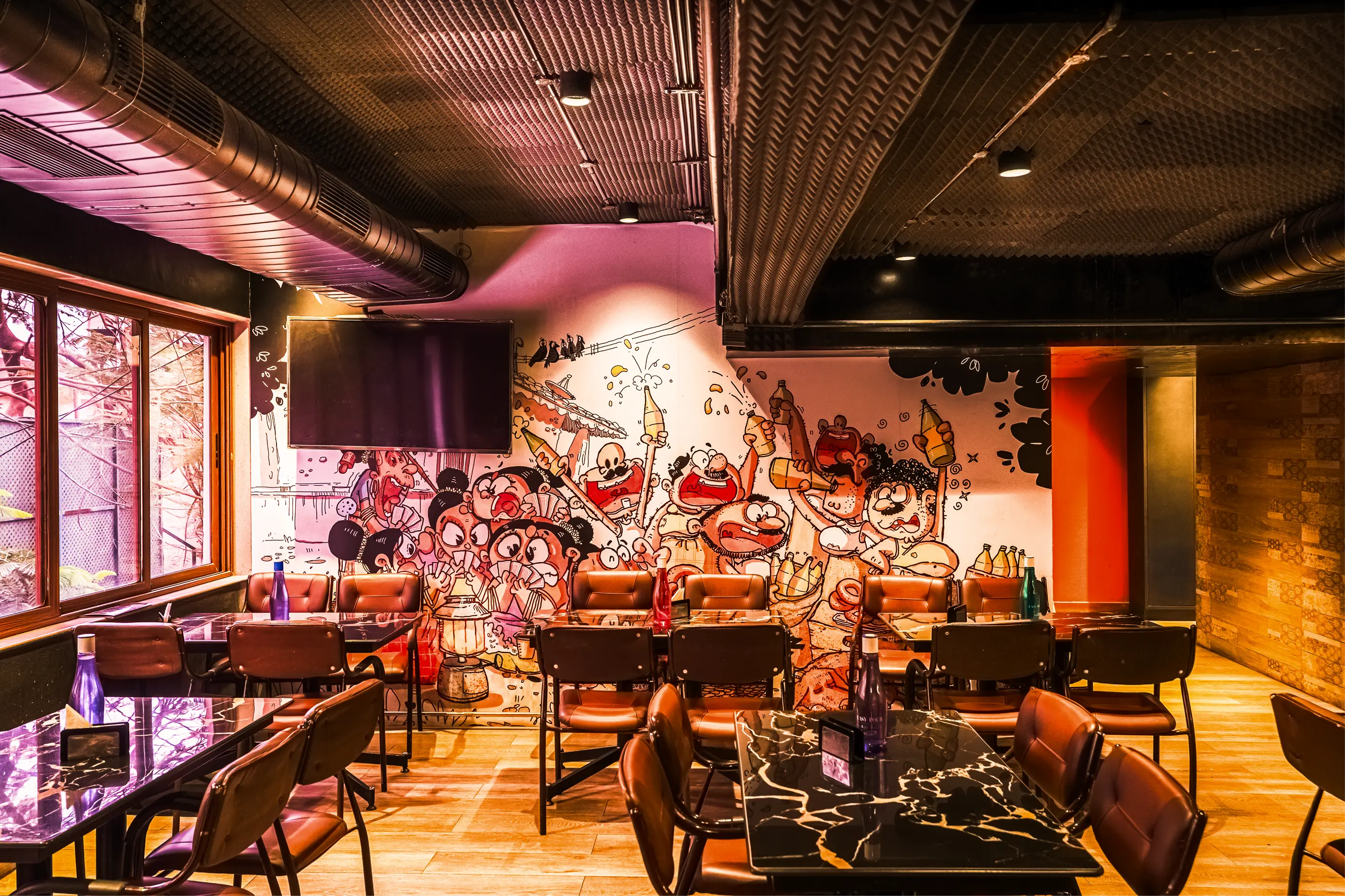 Seating area inside The Permit Room on Cathedral Road